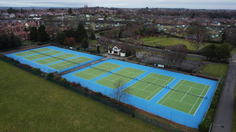 View from above of four tennis courts