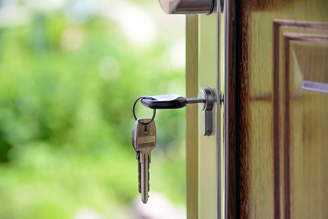 Photo of House keys in a door
