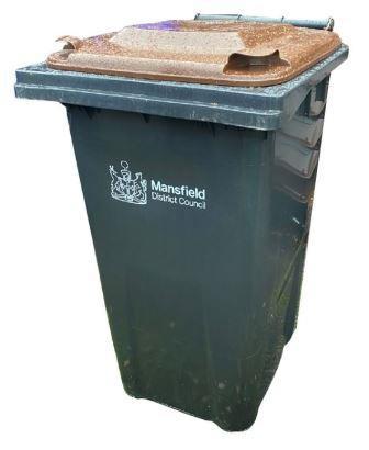 A photo of a MDC garden waste wheeled bin