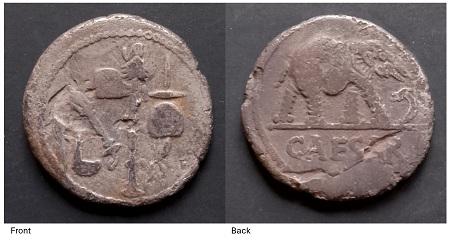 Photos of the front and back of a silver Roman coin from the Caesar which includes an elephant on it