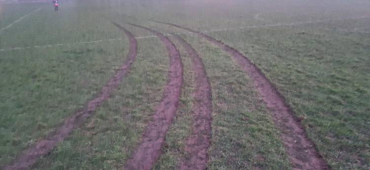 The grass at Carr Lane Park with tyre damage