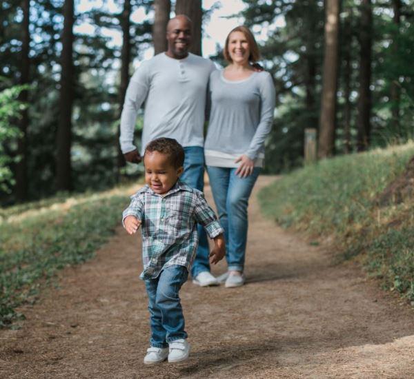 Family walking in the forest