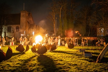 Fire garden art installation in Titchfield Park with crowd in the background