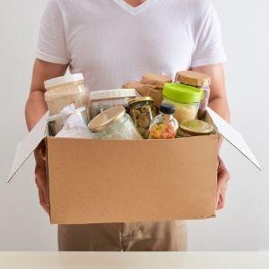 A photo of a person holding a food package