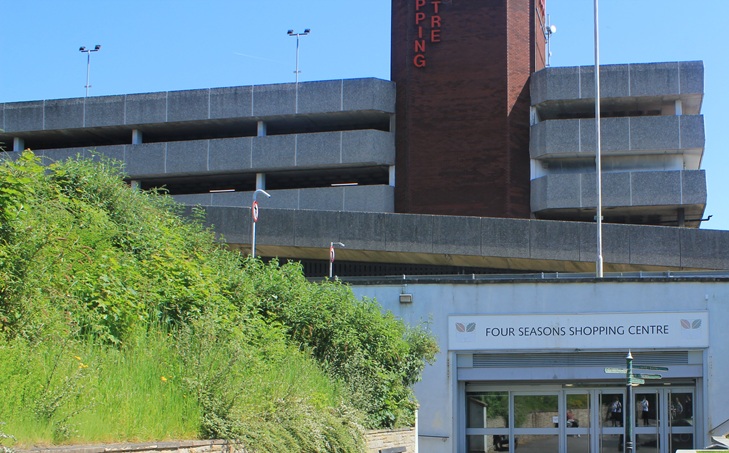 Photo of Four Seasons Shopping Centre multi-storey car park from the outside at a distance