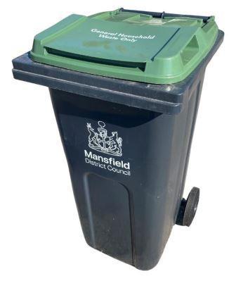 A photo of a MDC general waste wheeled bin