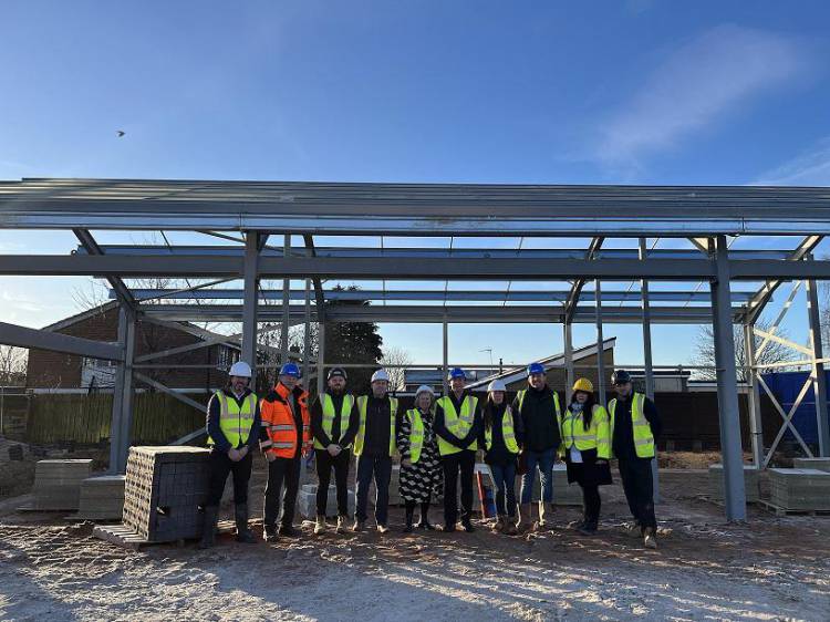 Mercer contractors, the Mayor and Anne outside the Bellamy shop structure