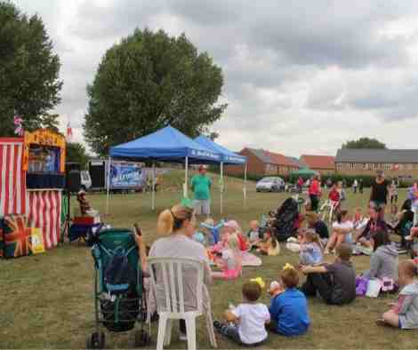 Image of families on Carr Lane Park for Summer Festival