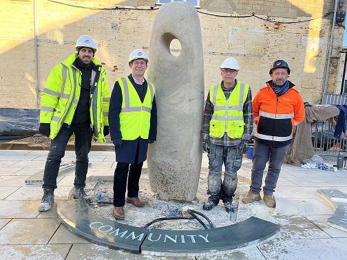 Galiford reps and the Mayor pose with memorial garden sculpture