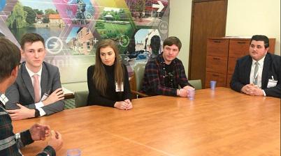 a photo of Mayor Andy with apprentices