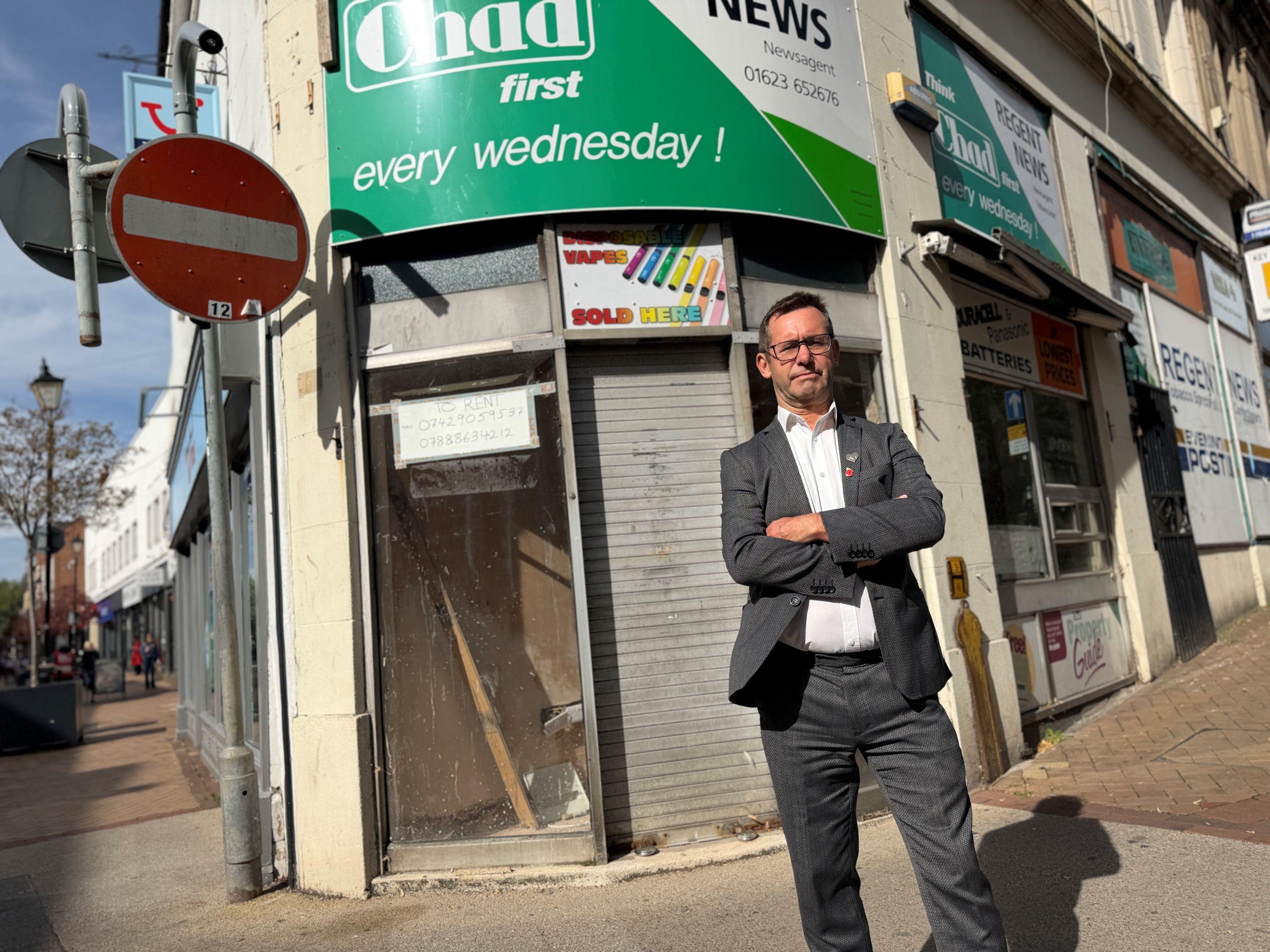 Mayor outside empty shop unit