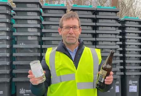 A photo of the Mayor with recyclable glass