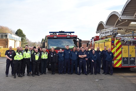 Photo of  Notts Fire and Rescue staff with Mansfield District Council Community Safety team on the Oak Tree Lane estate
