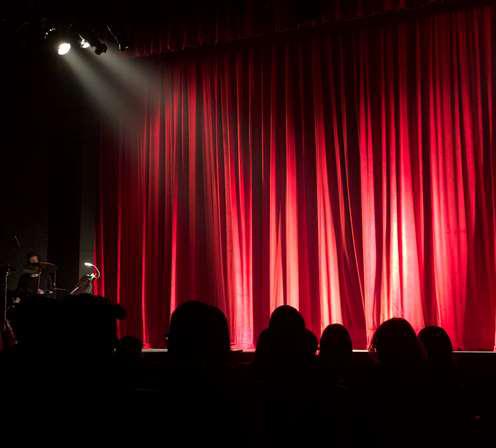 Image of theatre red curtains