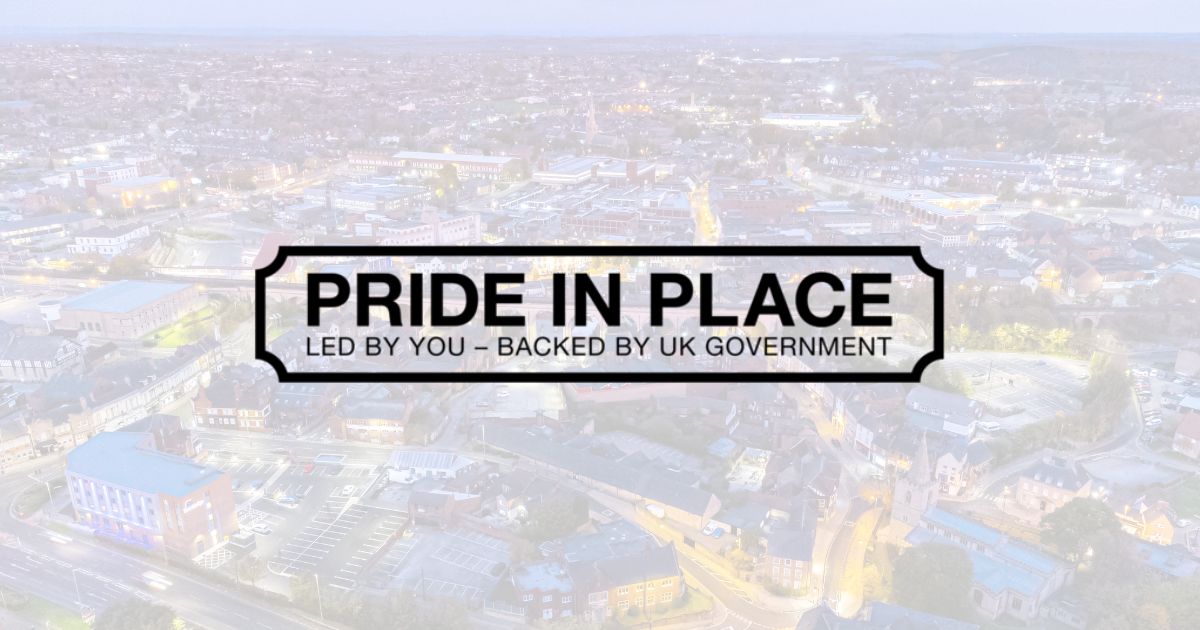 Pride in Place logo on top of a mansfield aerial picture