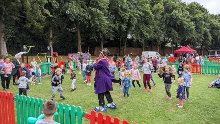 A photo of kids enjoying at clown activity at Wonderfest