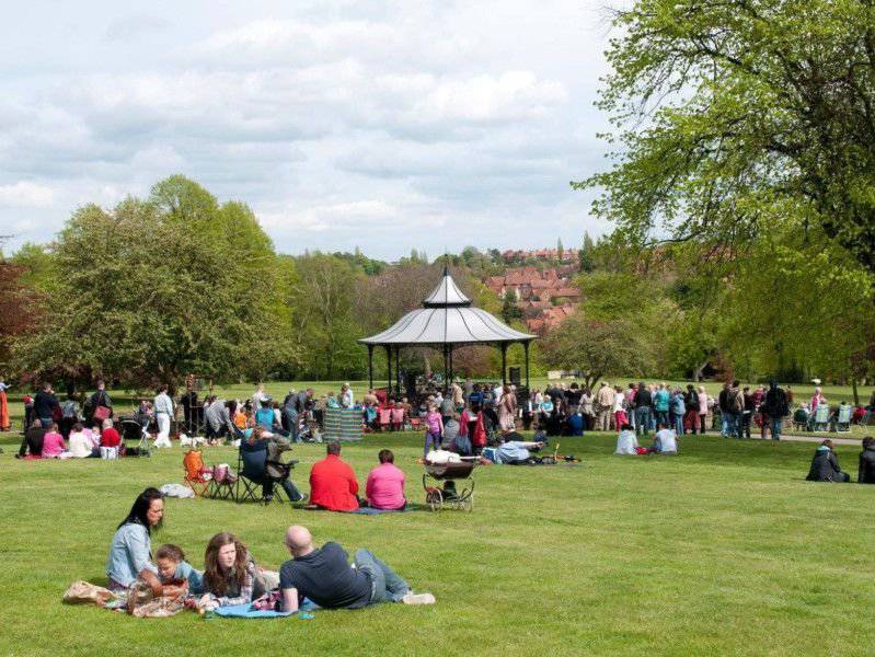 Photo of Carr Bank Park bandstand and people having picnics