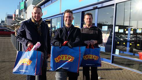 Photo of Paul Wheeler, the Chief Executive and director of Mansfield Building Society, Executive Mayor Andy Abrahams and Wayne Leatherhead, Manager of Smyths toy shop in Mansfield