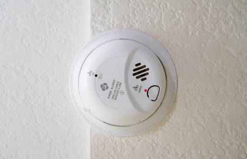 A picture of a Carbon Monoxide Alarm on a roof