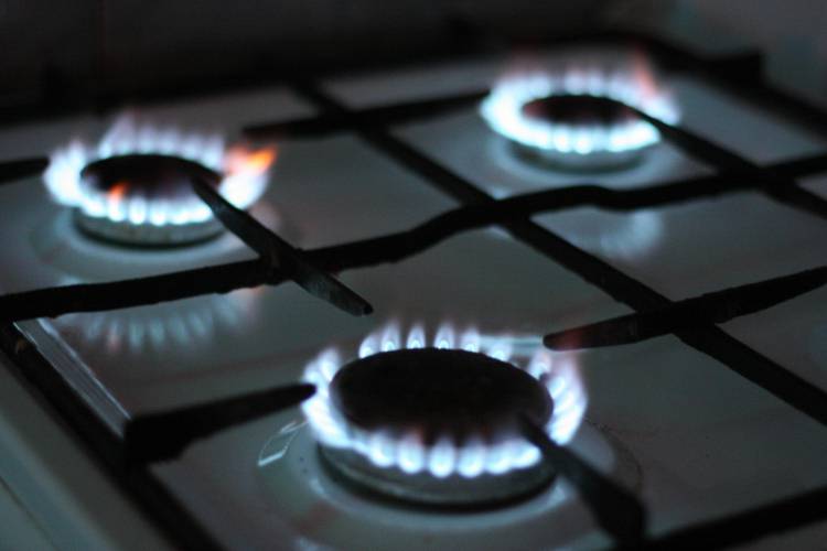 A picture of gas cooker hobs that are lit