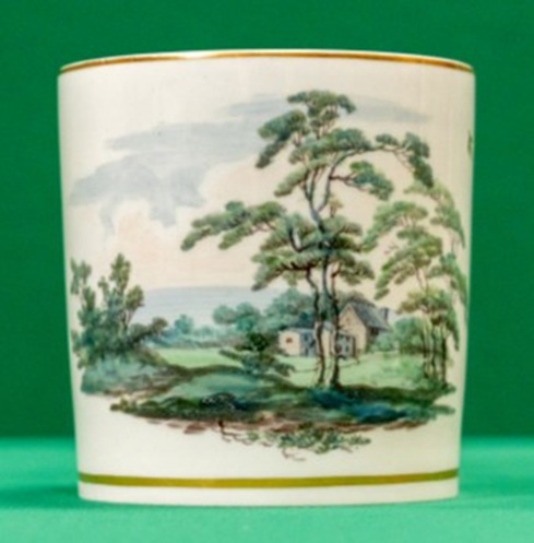 Large ceramic mug with painted landscape in blue and green