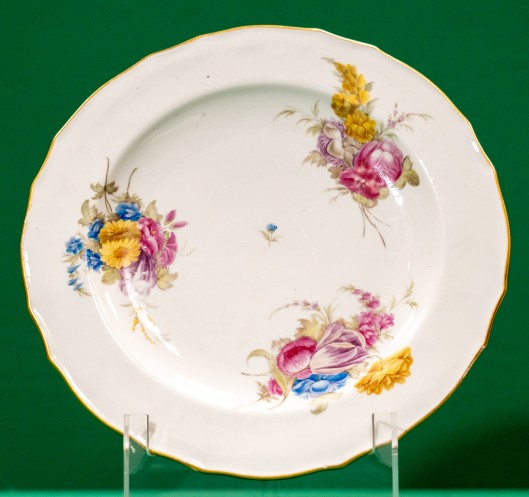 Dinner plate decorated with flower sprigs
