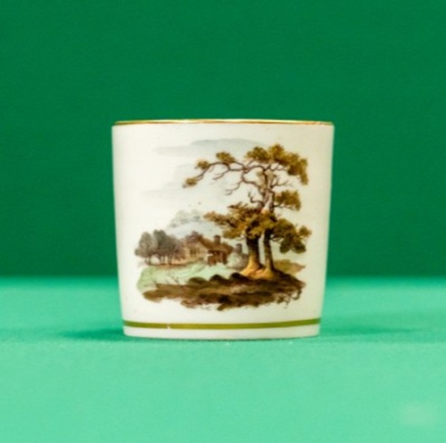 Coffee can with landscape in brown shades