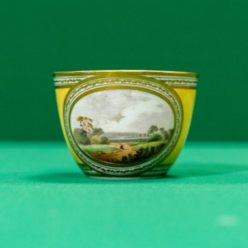 Ceramic teacup with landscape