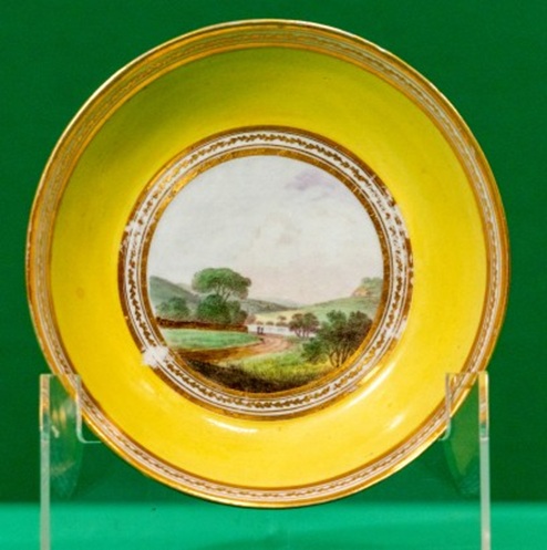 Ceramic saucer with landscape