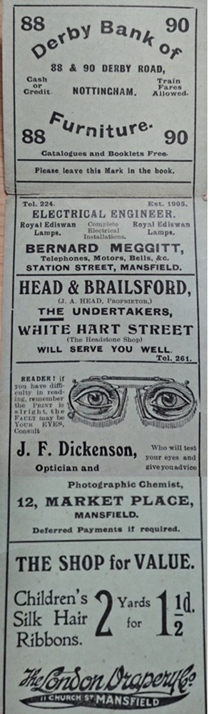 A bookmark printed with adverts for Mansfield businesses