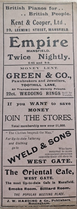 A bookmark printed with adverts for Mansfield businesses