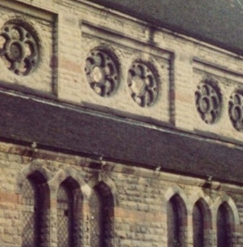 Detail of a faded colour photograph of church architecture