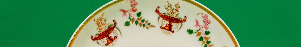 Detail of a painted porcelain saucer
