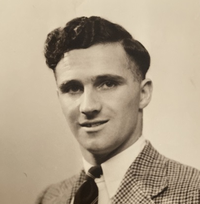 Detail of a sepia-coloured photo of a young man, taken in the 1940s
